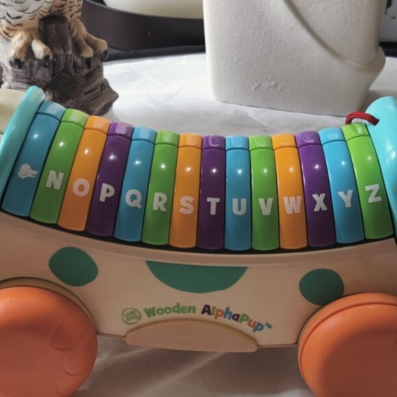 Wooden Alpha Pup Learning Toy, Pull along puppy teaches letters, sounds, songs. - Picture 3 of 10